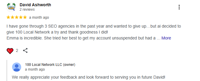 Two business people engaged in a handshake at a meeting, symbolizing partnership within 100 local networks.